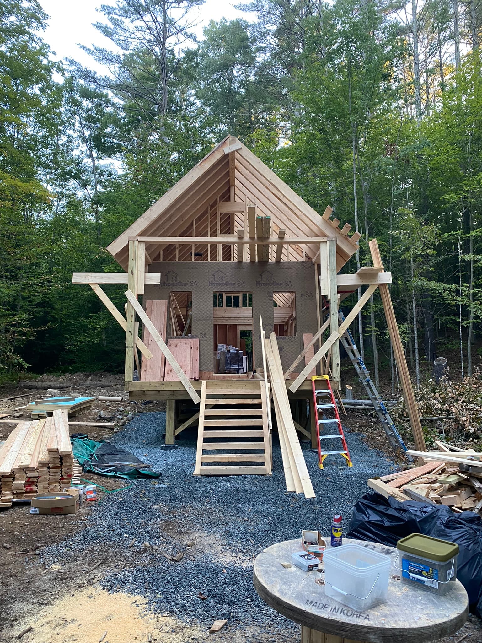 Cabin during framing phase in the woods