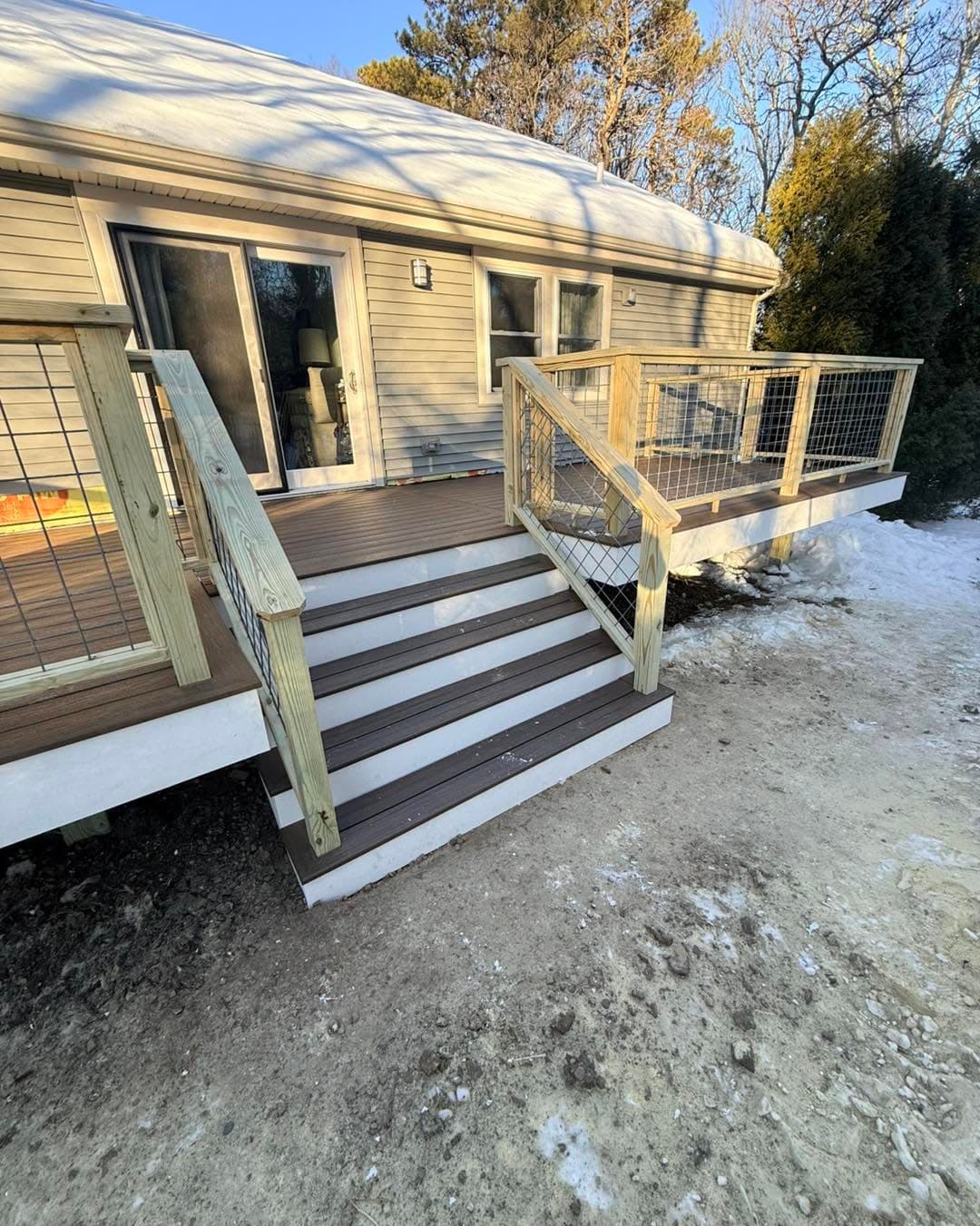 Composite deck stairs with cable railing