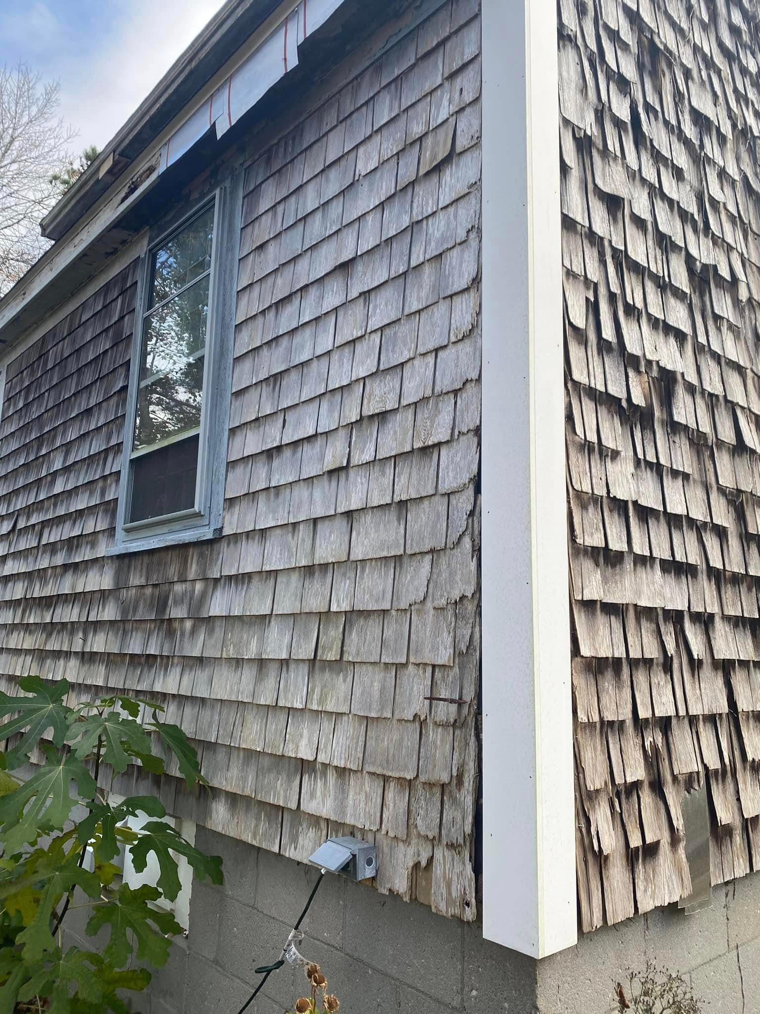 Cedar shingle siding corner detail with windows