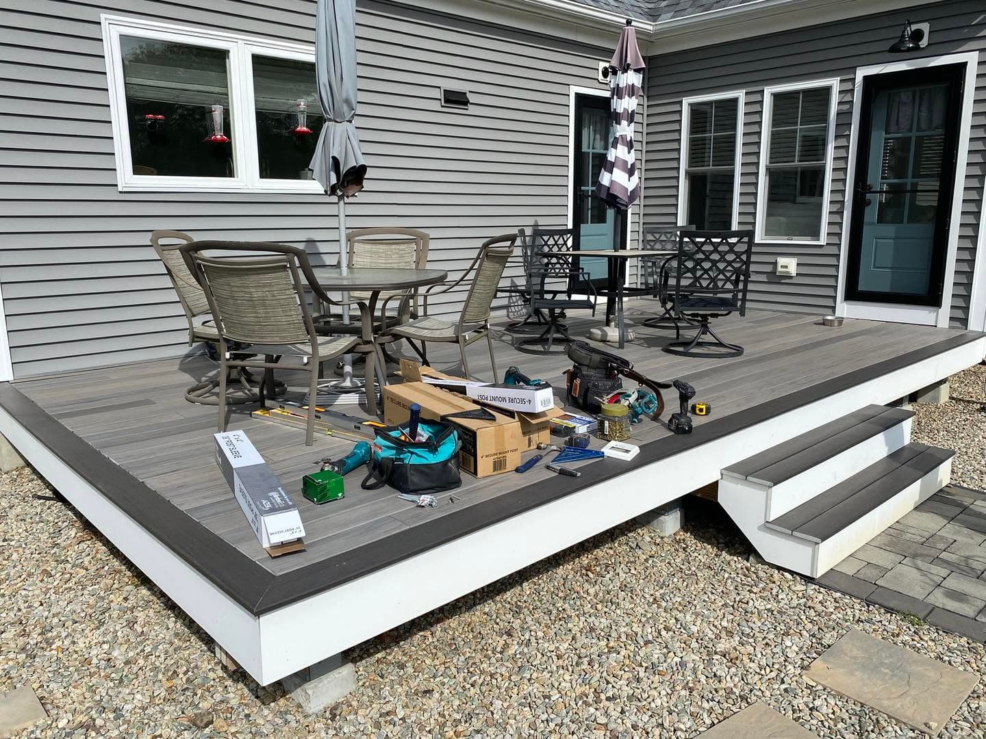 Finished composite deck with patio furniture
