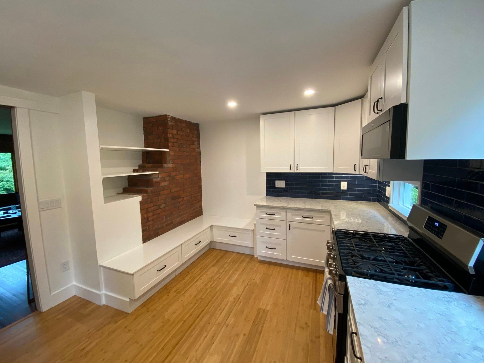 Kitchen mid-install with new cabinets going in