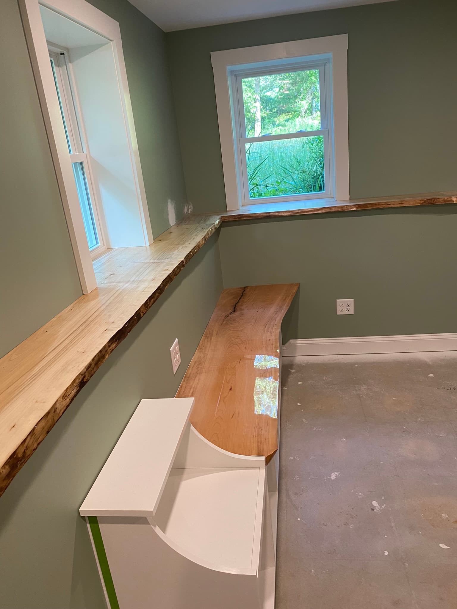 L-shaped live-edge wood countertop with epoxy finish