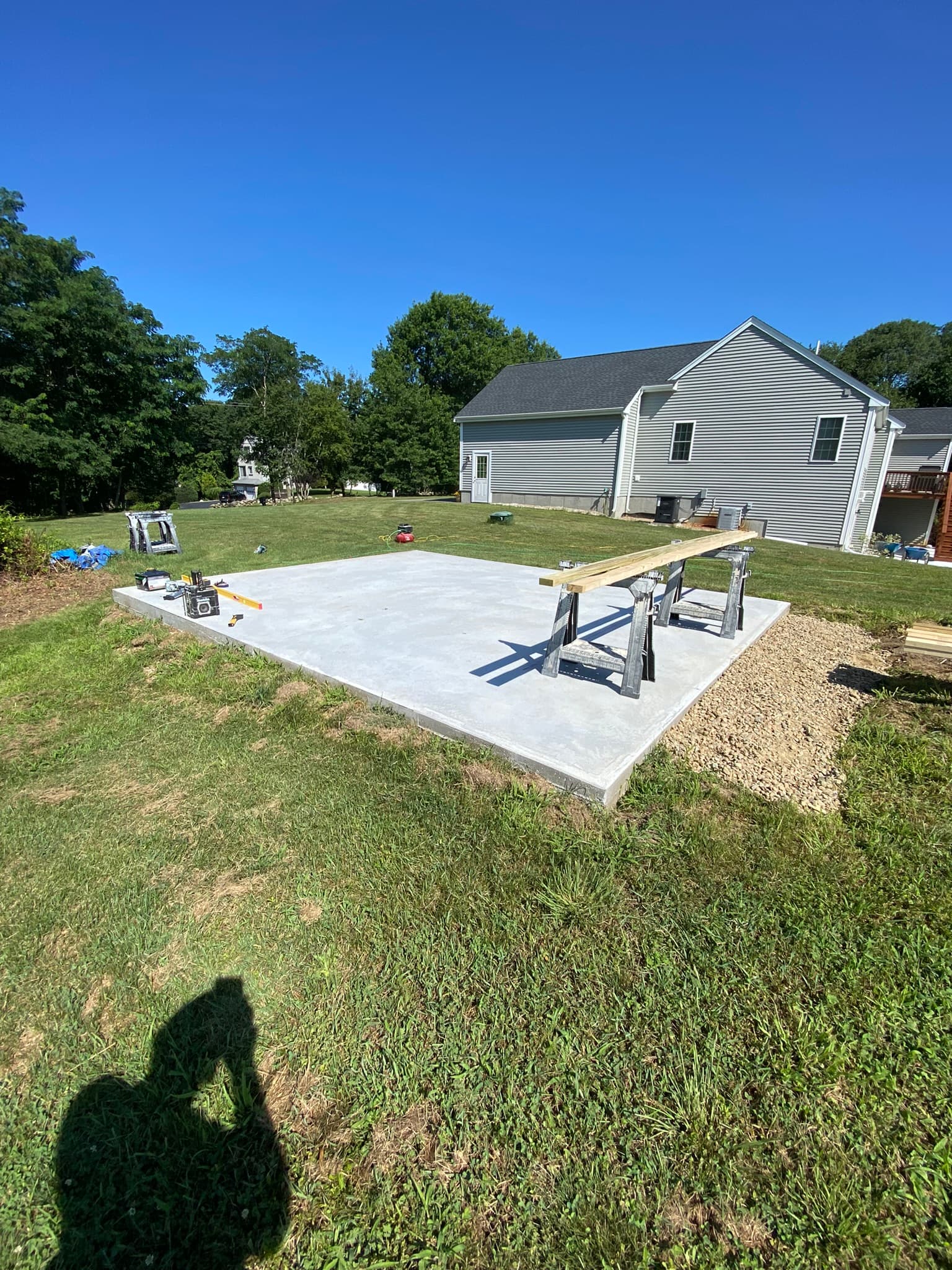Concrete slab foundation before shed construction
